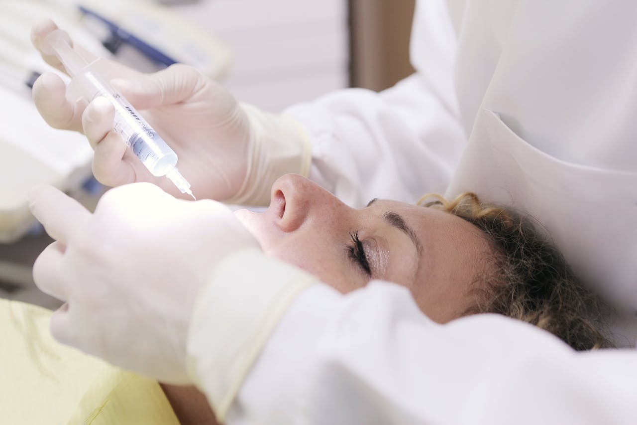 a woman gets a Botox injection